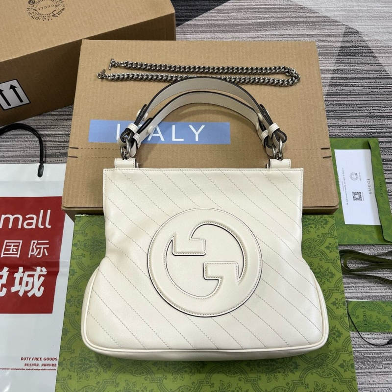 G*u*i top handle bags